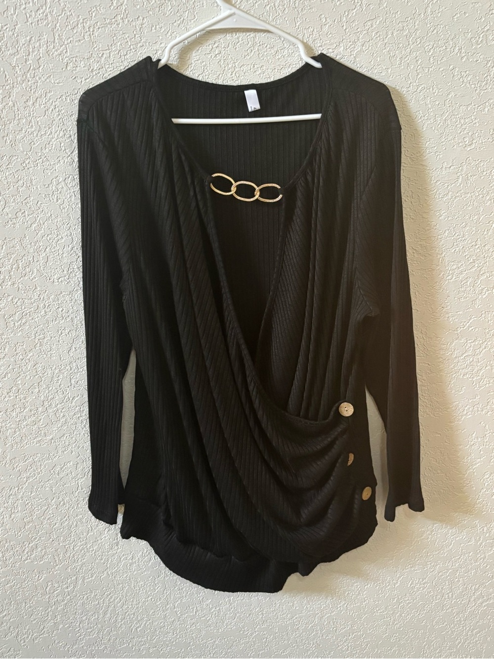 Black Long-Sleeve Women’s Top with Gold Accent